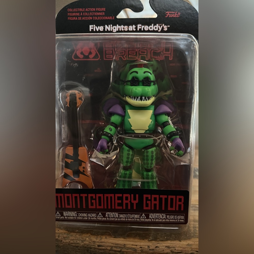 Funko Montgomery Gator Figure - Green and Purple